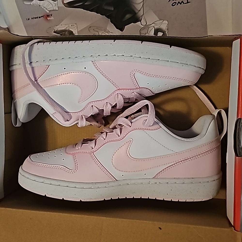 Pink and white Nike low
